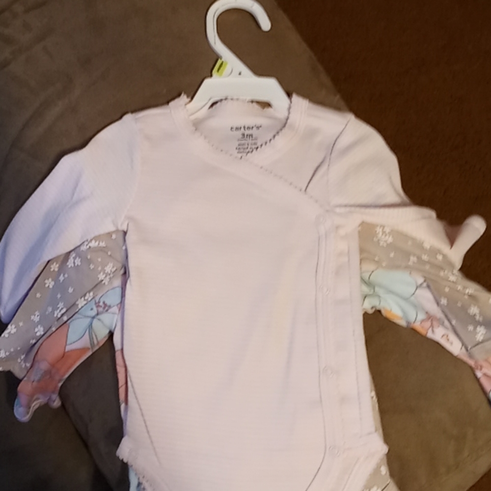 Three bodysuits